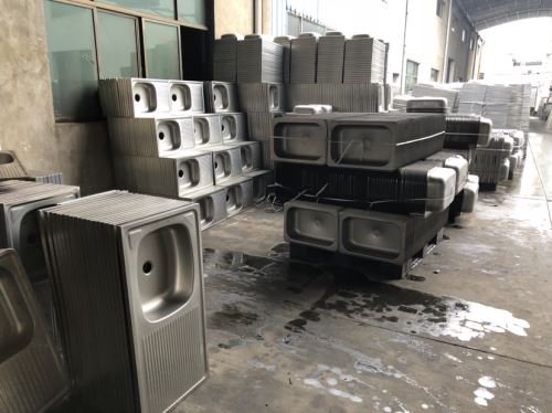 mass kitchen sinks in warehouse